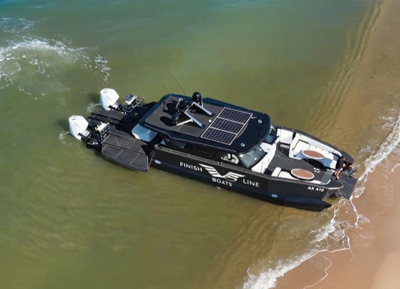 Beach landing catamaran on shoreline